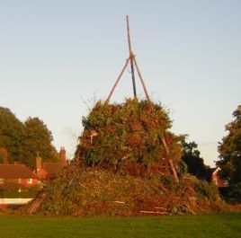 Bonfire lit by afternoon sun