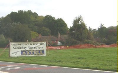 Banner on the green advertizing bonfire