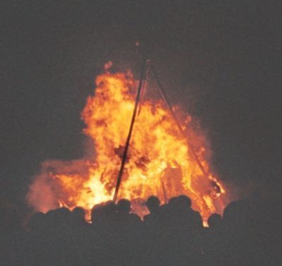 Bonfire burning view of tripod