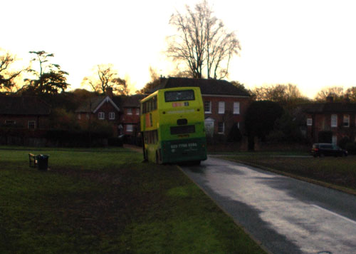 Buss on edge of road