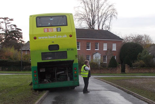 Buss on edge of road