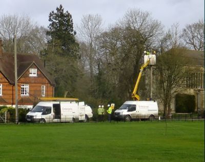 vechiles doing cable repair including cherry picker