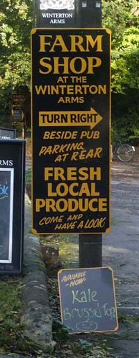 Sign pointing to Farm Shop
