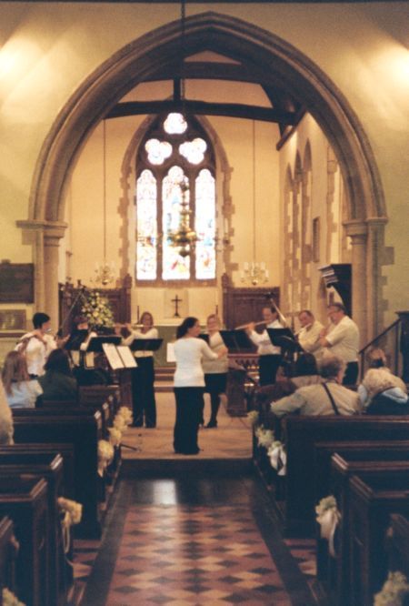 Flute players in church