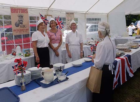 Ladies serving tea