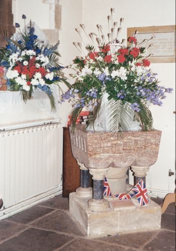 Flowers in church - in Font 