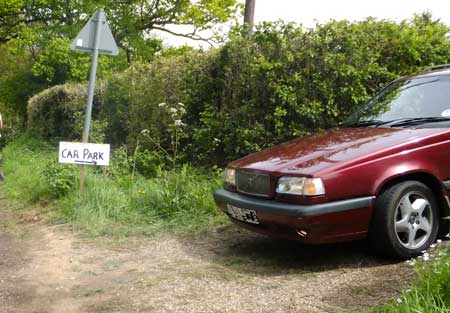 Entrance to Car Park with Volvo exiting