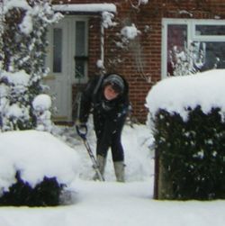 person shoveling snow