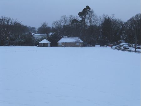 Snow scene Cricket Green and pavalon