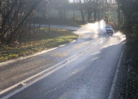Car going through water at Anstead Brook