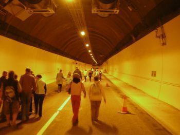 people walking thrugh Hindhead tunnel