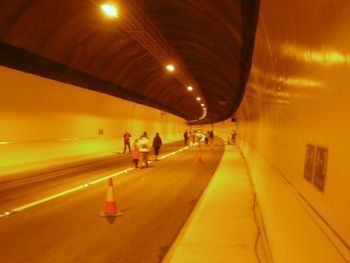 people walking thrugh Hindhead tunnel