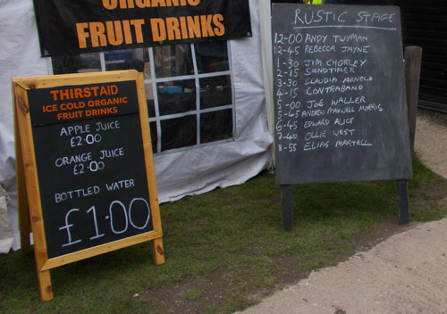 Blackboard  with list of atrist on Rustic Stage