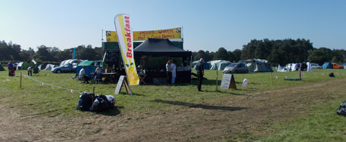 Food bar in camp site many tents gone